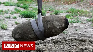 Unexploded WWII bomb revealed in drought-hit Italian river - BBC News