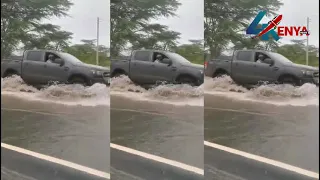 WATCH TRAFFIC POLICE CONTROLLING VEHICLES AT RUAI BYPASS AFTER FLOODS SWEPT AWAY THE BRIDGE