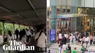 People flee Bangkok shopping mall after three killed in shooting