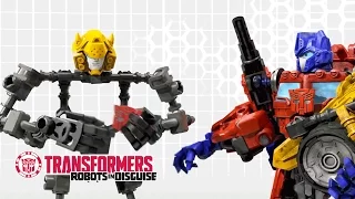 Transformers: Construct-Bots - Optimus Prime Helps Complete Bumblebee | Transformers Official