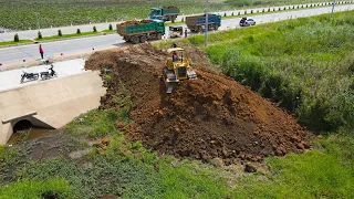 Great Project Landfill Next to the National Road by Excellent Operator Bulldozer Push Soil Drop Down