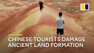 Chinese tourists damage ancient land formation