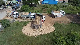 Nice cool project! Develop city by trucks dumping soil to landfill pushing & Komatsu d20p bulldozer