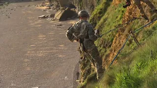 Veterans watch US Rangers scale Normandy cliffs