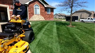 Mowing Overgrown Residential Lawn With Hustler Super SF
