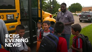 School surprises bus driver with new car and raise