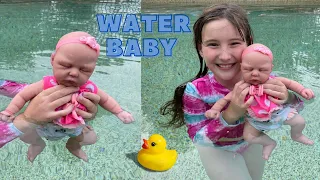 SILICONE BABY MIMI'S FIRST TIME SWIMMING