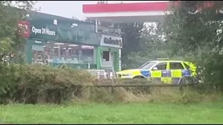 ARMED HOSTAGE SIEGE AT PETROL STATION IN BRISTOL, ENGLAND.