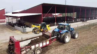 SPREADING MANURE OUT OF OUR MONOSLOPE BARNS