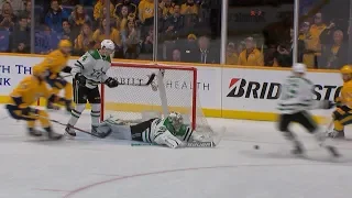 Anton Khudobin fully extends for tremendous glove save on Fiala