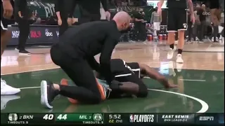 Kyrie Irving twists his ankle after landing on Giannis's foot 😰😰 Nets vs Bucks