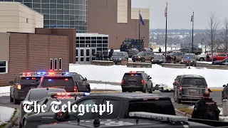 Michigan school shooting: Pupils hide from gunman in locked classroom