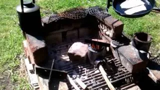 Egg and bacon on the mini rockert woodgas stove by Russell Kent