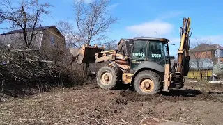 Корчевание пней и выравнивание участка трактором