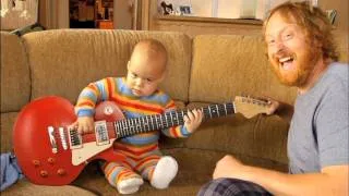 Rocksmith - Baby plays Guitar | OFFICIAL | HD