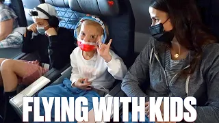 FLYING ON AN AIRPLANE FOR SEVEN HOURS WITH FOUR KIDS | FIRST FAMILY FLIGHT TO MAUI HAWAII