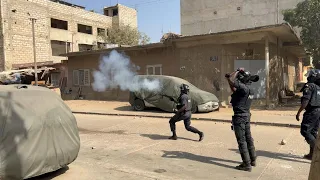 Demonstrators clash with security forces in Senegal capital (2) | AFP