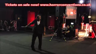 Tom Savini cracks his bullwhip at HorrorCon UK 2015 Horror Convention