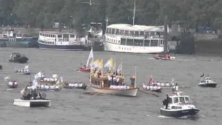 Olympic flame on Thames between Waterloo and Blackfriars