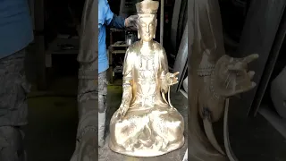 The process of making a giant golden Buddha statue. A Korean master craftsman.