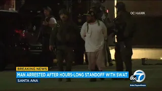 Man with gun arrested after hours-long standoff in OC parking lot