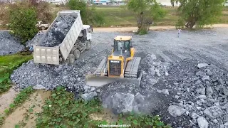 Incredible Bulldozer SHANTUI Pushing Big Stone into Lutos lake with many Dumps truck 25T Unloading