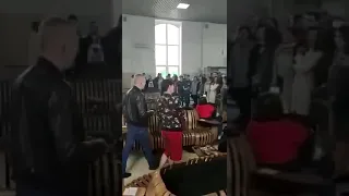 Ryazan, Russia, railway station. People spontaneously sing for departing paratroopers.