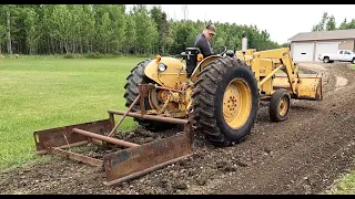 Tractor land plane with lawn edger