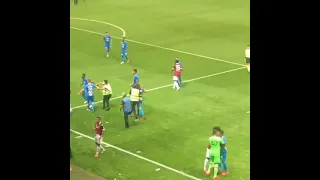 Dimitri Payet attacked by bottles while taking a corner and he did throw them  back at the fans