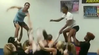 Girl Faces Fall Trying New Pyramid Trick With Fellow Cheerleaders - 1057542