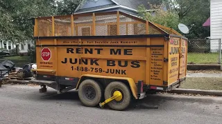 Delivering a 21-yard Dumpster Rental on Wheels in Gulfport, Ms