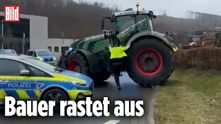 Traktor durchbricht Polizei-Sperre