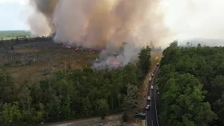 Drone video shows Tiger Island Fire continuing to burn