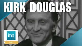 1958 : Kirk Douglas répond en français à France Roche  | Archive INA