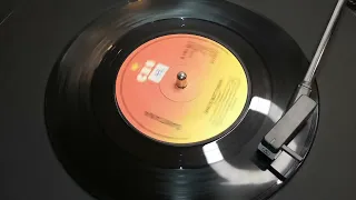 Santana - She's Not There (1977 7" Single)