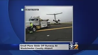 Plane Skids Off Runway