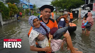 Floods, landslides in Indonesia kill at least 19