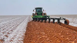 Plowing mile long rows in the snow