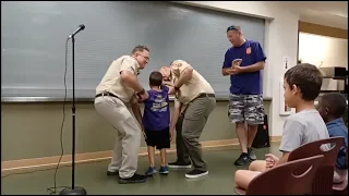 James getting his cub scout bobcat badge