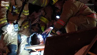 Boy pulled from rubble after Surfside building collapse