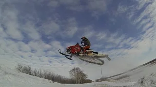 Snowmobile jumps 100ft in HD! Jaws race exhaust.