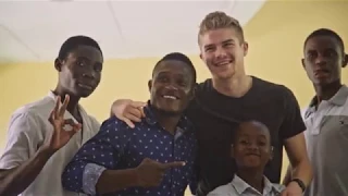 Simon Ollert, pro soccer player with hearing loss supports project work in Malawi