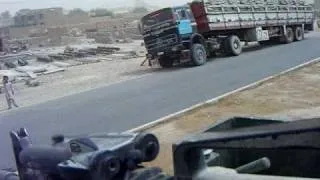 CANADIAN FORCES DRIVING THROUGH KANDAHAR AFGHANISTAN