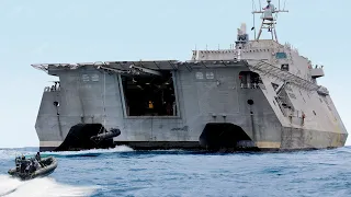 Massive Futuristic US Ship in Action During High Sea Patrols