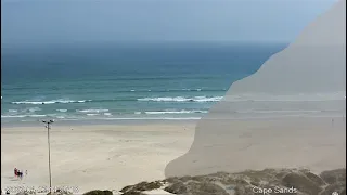 Watch Cape Town mist covers surfers and family on the beach in 5 minutes at Strand beach Livestream