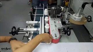 Wrap-around Labelling Machine | self-adhesive label | Solo Labeller Technology