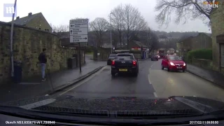 Pedestrian throws HIMSELF at passing car in Huddersfield