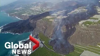 La Palma volcano: Drone video shows 2nd lava stream engulfing plantations on way to sea