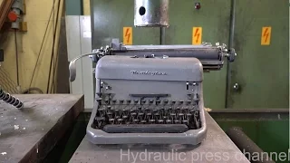 Crushing typewriter with hydraulic press