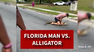 WILD VIDEO: Florida man uses bare hands to remove 8-foot gator from busy road